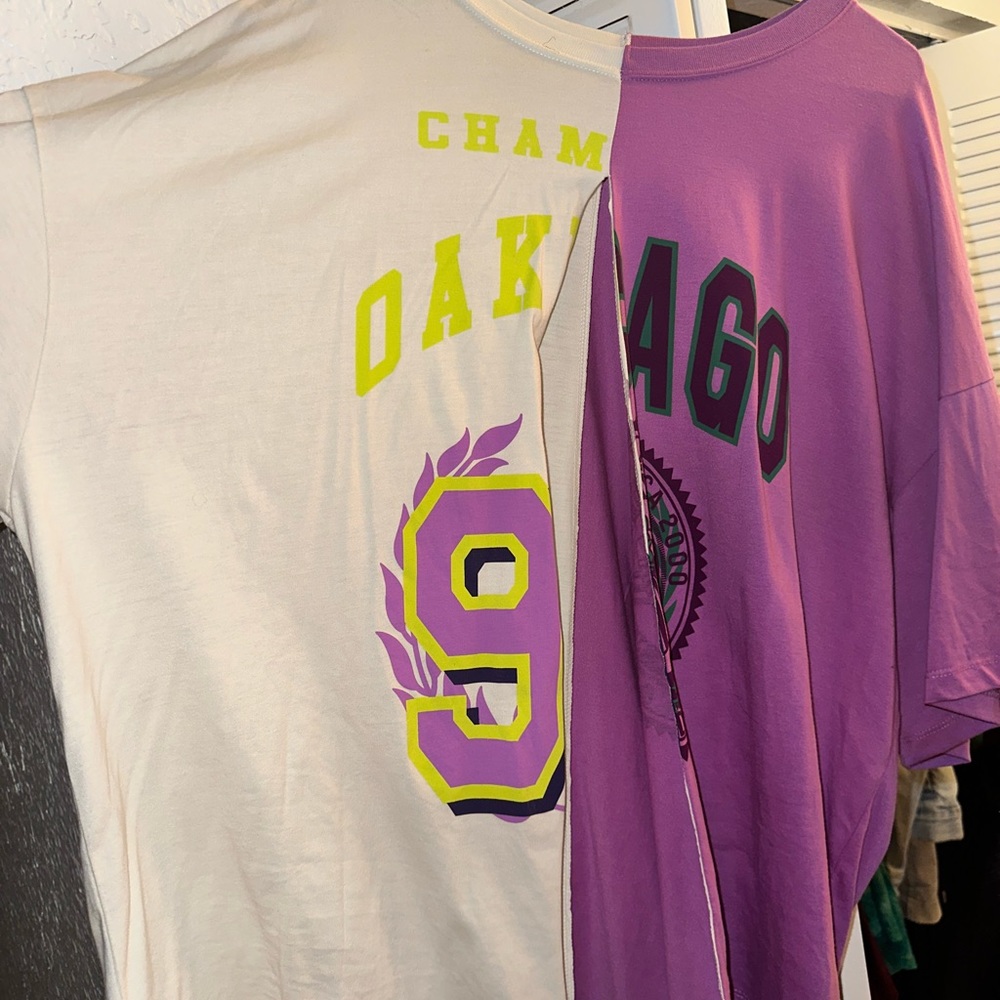 Oversized T shirt w/split down the middle can be tied into bow optional